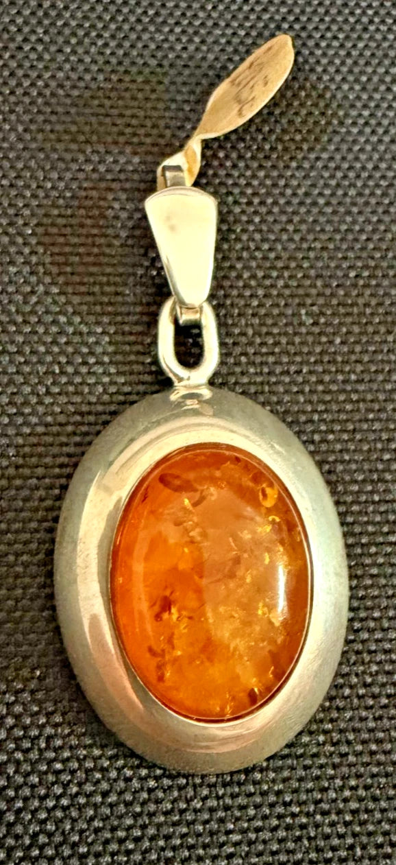 Chunky Silver Domed Edge Oval Amber Pendant