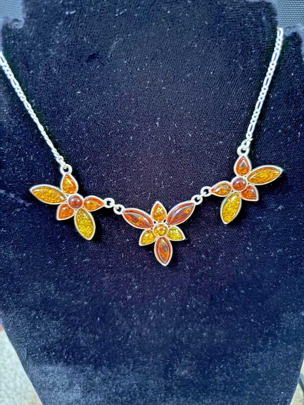 Silver Figaro Chain Set With 3 Assorted Colour Amber Floral Sections