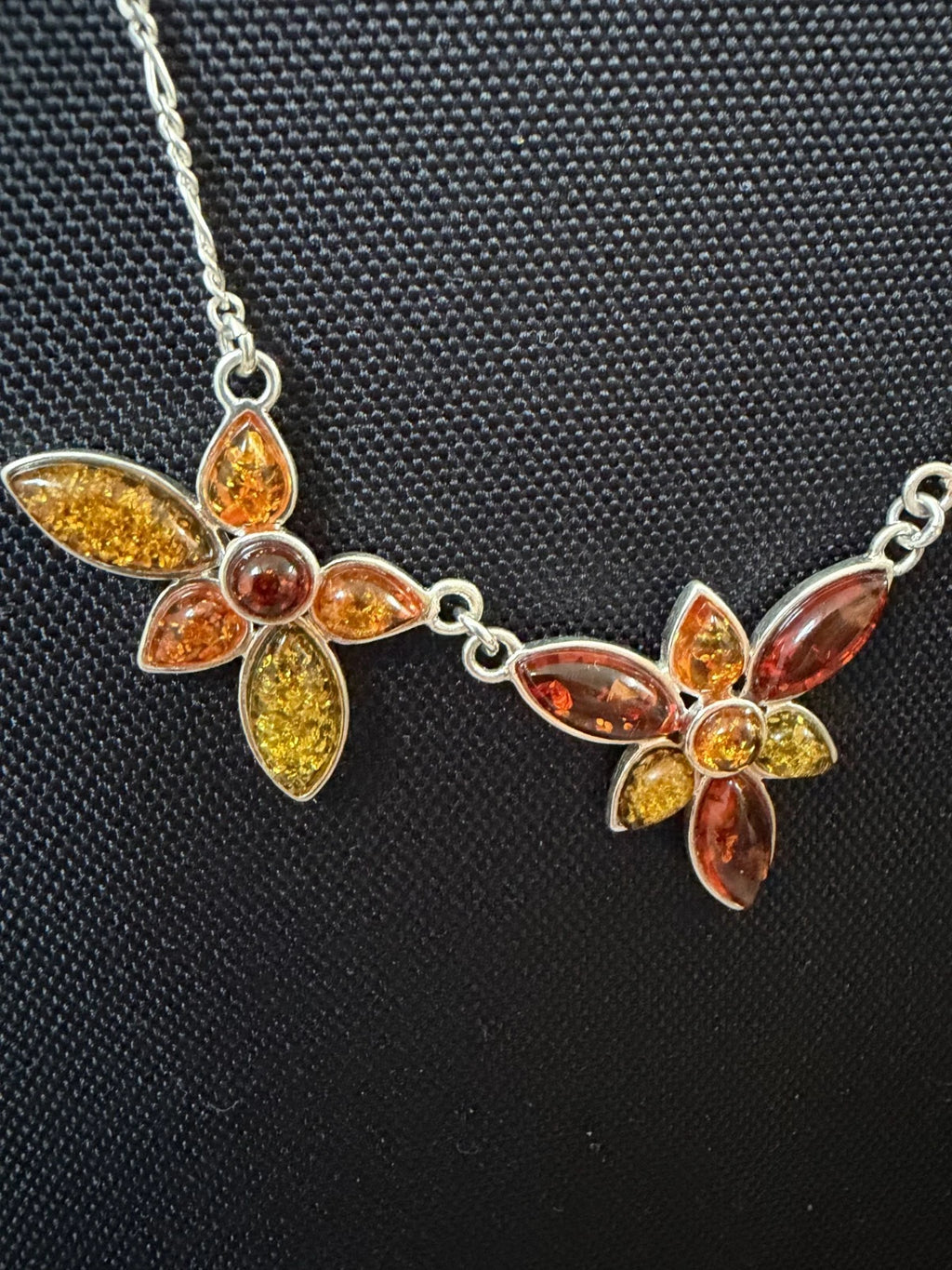 Silver Figaro Chain Set With 3 Assorted Colour Amber Floral Sections