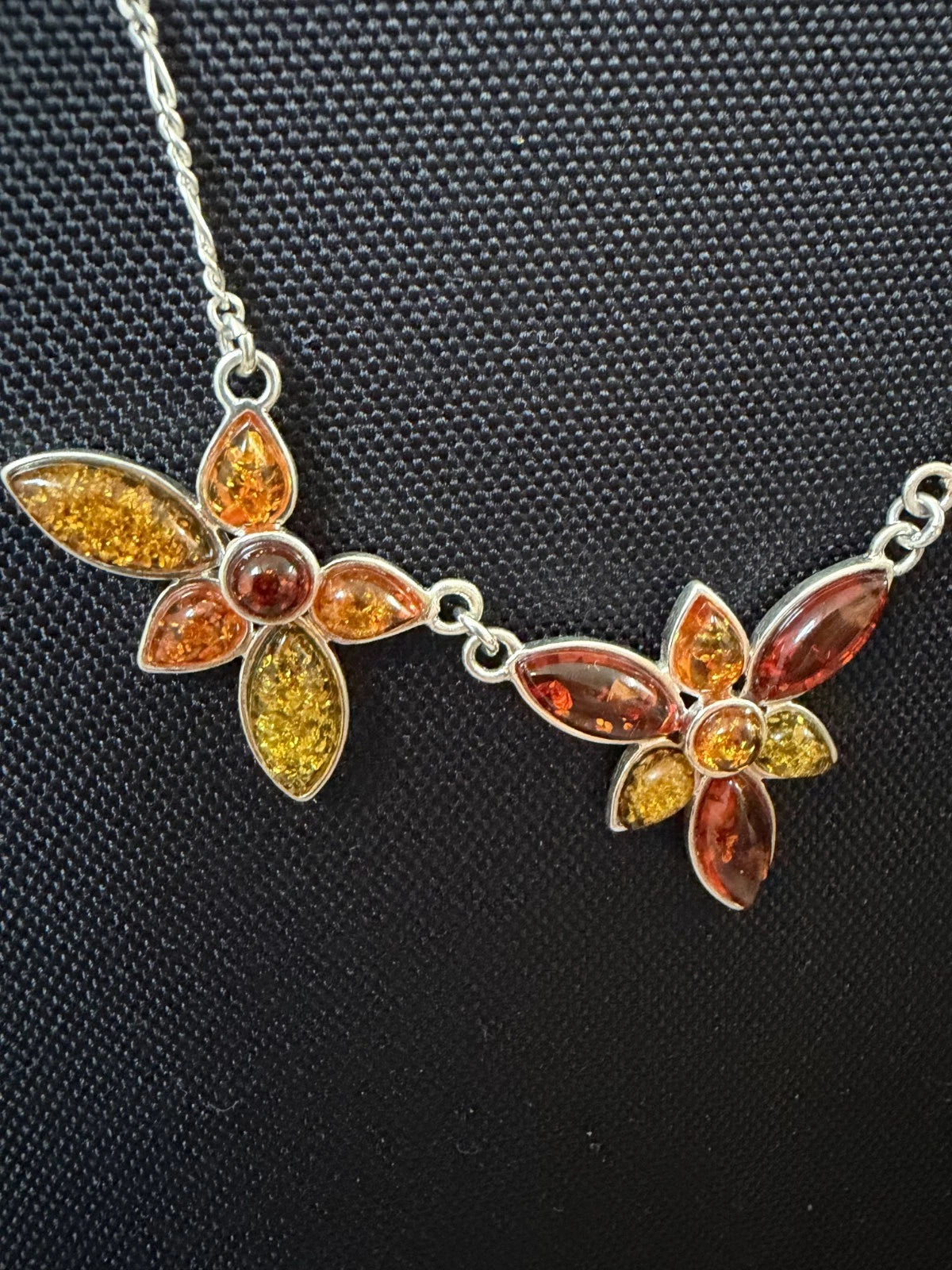 Silver Figaro Chain Set With 3 Assorted Colour Amber Floral Sections