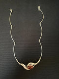 Silver Oval Amber Set In A Crossover Of Silver on Handmade Long Bar Link Chain