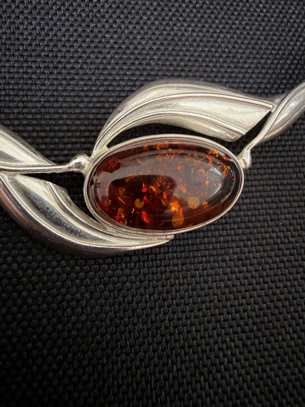 Silver Oval Amber Set In A Crossover Of Silver on Handmade Long Bar Link Chain